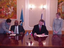 H.E. Mr. Anthony B. Severin - Left and Mr. Gennady Galilov - Right, signing the agreement