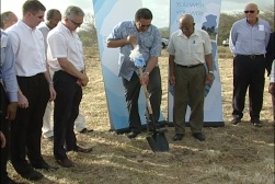 Prime Minister Dr. Kenny Anthony turning the sod for the construction of the new property