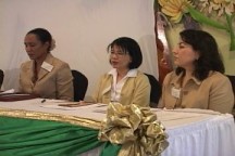 Local and World Bank officials look on