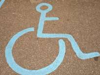Blue road markings signifying parking for the disabled