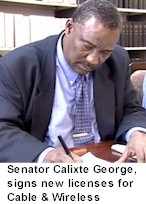 Senator George signs new Cable & Wireless licenses