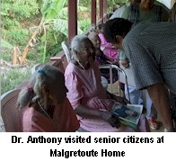 Dr. Anthony with Senior Citizens at Malgretoute Home