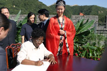 Governor-General signs Visitors' Book at the Great Wall of China