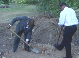 Hon. Ferguson John Minister for Physical Development, Environment and Housing and Hon. Ignatius Jean District Representative for Castries North symbolically break ground