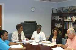 Paula James, President of St. Lucia Amateur Swimming Association; Brenda Boland, President of Trident Swim Club; Yasmin Tyson, President of Hurricane Swim Club; Cheryl Renwick, Public Relations Officer, St. Lucia Amateur Swimming Association; Joseph "Reds" Perreira, Sports Consultant at the St. Lucia Tourist Board