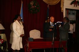 Sir John Compton Swearing his oath of allegiance and secrecy.