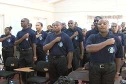 Recruits reciting the pledge of office  ahead of their deployment at Bordelais